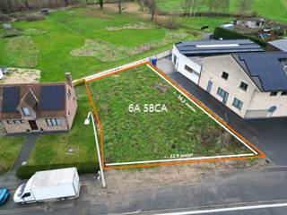 Voor meer info of een bezoek, bel 053 59 49 33 - Deze bouwgrond van ca. 658 m², gelegen langs de Brusselsesteenweg 434(a) te Meerbeke...