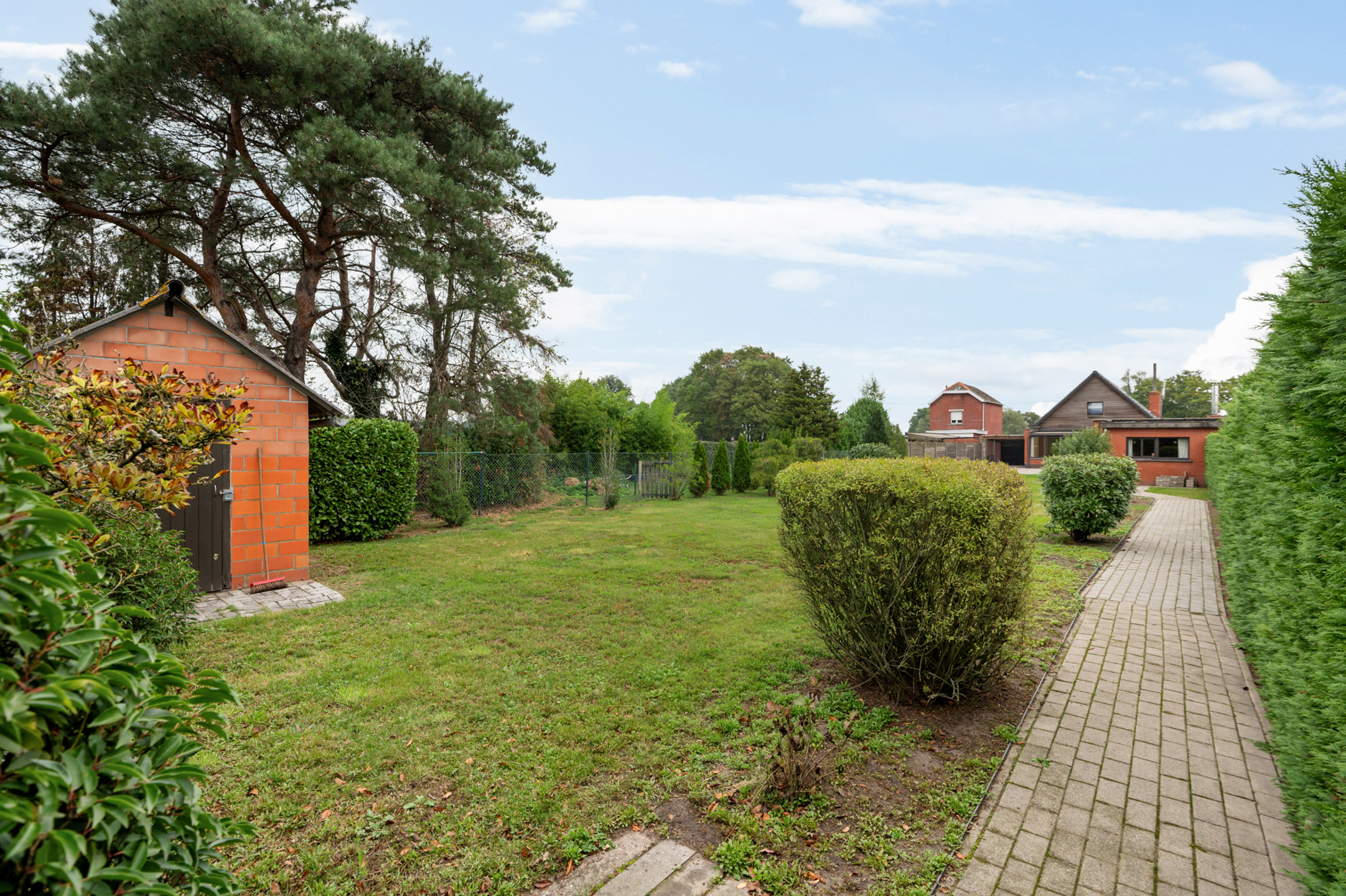 Charmante woning met grote tuin - foto 4