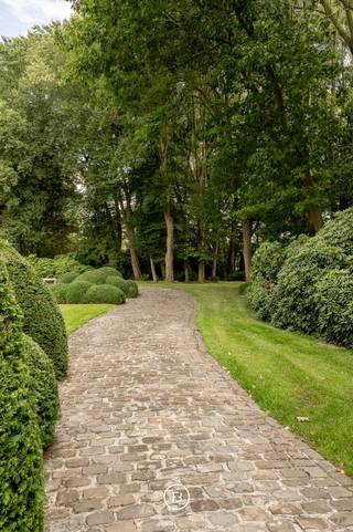 Set in a quiet, green location near the centre of Izegem, this characterful villa was designed by Marcel Raymakers of Queen of the South...