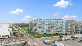 Looking for a ready-to-move-in apartment with a beautiful view of the sea and the harbour channel? This bright two-bedroom apartment is located on the fifth floor and has no less than three terraces. The apartment was built in 1990 and renovated in 2019. Thanks to its spacious living space, high-quality finish and excellent light, you will enjoy pleasant living comfort.<br /><br />The living space of no less than 41 m² consists of a cozy sitting area, dining area and a spacious 11 m² open kitchen. From the living area, you have access to two terraces. The third terrace is accessible from the bedroom. The installed kitchen has a Miele oven, induction hob, refrigerator, freezer and dishwasher. The apartment also has a private basement with a connection for a washing machine and dryer.<br /><br />Layout:<br /><br />Entrance hall<br />Bright living space with dining area and open kitchen<br />Two terraces adjacent to the living space<br />Bedroom 1 with access to the third terrace<br />Bedroom 2<br />Bathroom<br />Separate toilet<br />Storage<br />Private basement storage<br /><br />Advantages:<br /><br />Beautiful view of the sea and the harbour channel<br />Three terraces<br />Spacious living space of 41 m²<br />11 m² open kitchen<br />Renovated in 2019<br />Ready to move in<br />Parquet floor<br />Possibility to purchase a spacious garage box of 26 m²<br /><br />Are you looking for a ready-to-move-in apartment with two bedrooms, spacious terraces and a beautiful view of the sea and the harbour channel? Don't hesitate to contact us for more information or a visit!<br /><br />Register of measures: no