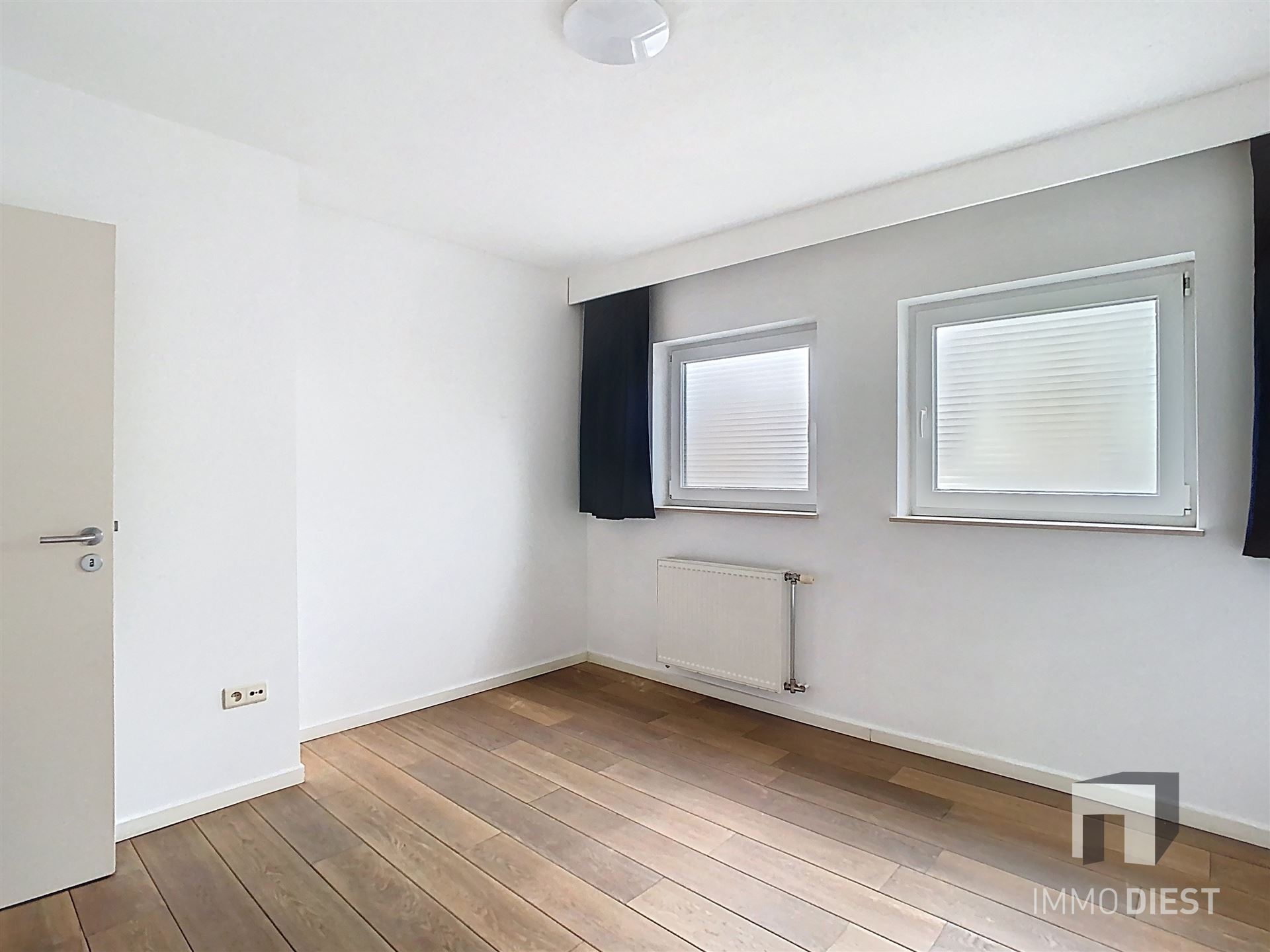 Gelijkvloers appartement met ingesloten koertje - foto 5