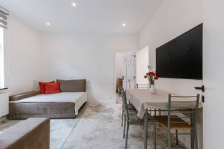 Instapklaar appartement op een toplocatie in Sint-AmandsbergEPC-score: CMobi-score: 9.4/10In de Kunstenaarstraat 21 in Sint-Amandsberg bevindt zich...