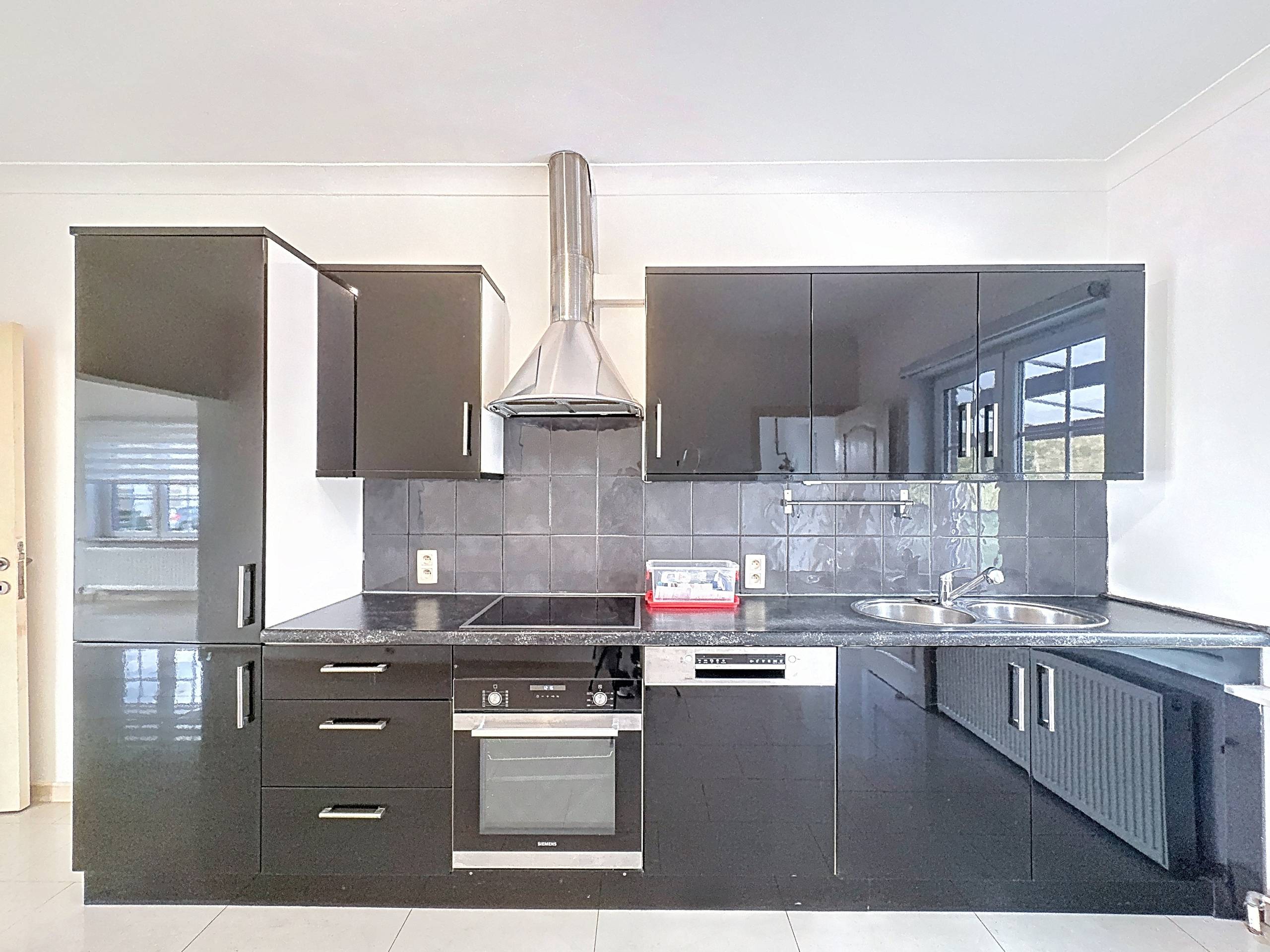 Halfopen woning met tuin in Grimbergen - foto 4