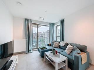 Nieuwbouw appartement met prachtig uitzicht over ’t Eilandje en de Schelde. In de nieuwe residentie DOKTOREN nabij het Kempisch dok en Park...