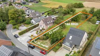 Bouwgrond voor open bebouwing!In het landelijke Wambeek bieden wij u dit uniek perceel bouwgrond met een oppervlakte van 12 are 60 ca. aan, ideaal...