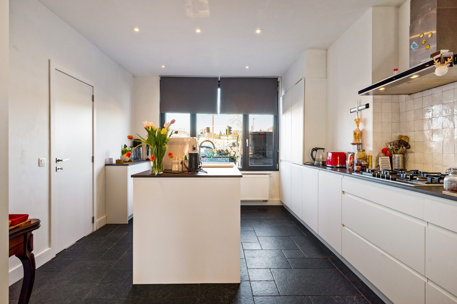 Instapklare gezinswoning met 3 slaapkamers en tuin in Wijnegem - foto 4