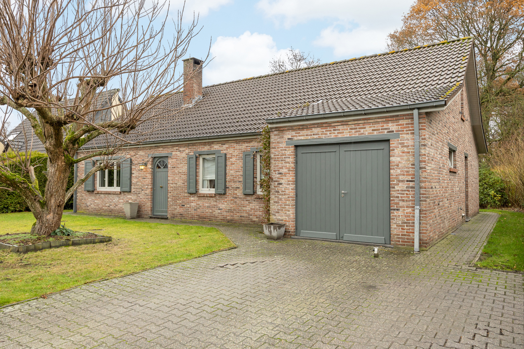 Rustig gelegen laagbouwwoning met mooie tuin - foto 1