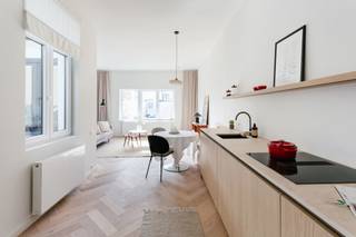 Quares - Group TREVI presenteert :Appartement op de eerste verdieping te koop in een kleinschalig gebouw met slechts drie entiteiten, gelegen in de...