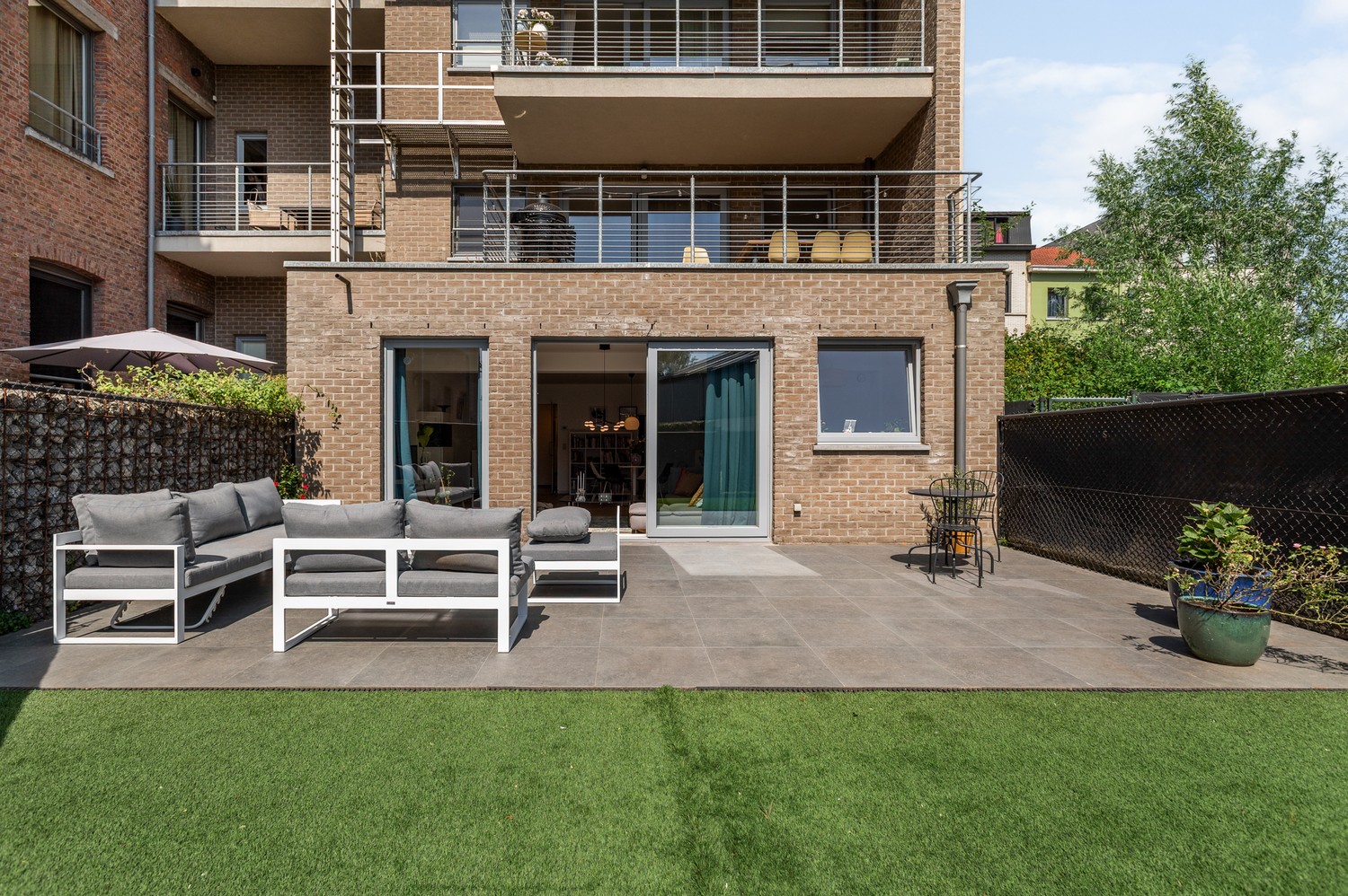 Instapklaar gelijkvloers appartement met 3 SLPK en een ruim tuin/terras in Antwerpen! - foto 1