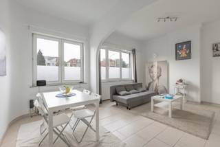 Opbrengsteigendom met 4 appartementen, crèche en praktijkruimte op toplocatie te DilbeekDit opbrengsteigendom op een commerciële locatie in het...