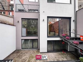 <p><span>Discover this unique modern and prestigious yield property, ideally located in </span><span>Ganshoren</span><span>, on the border with Sint-Agatha-Berchem, with </span><span>direct access to the center of Brussels</span><span>, the Ring Road, stores and schools.<br />With a total living area of </span><span>595 m²</span><span> on a plot of </span><span>285 m²</span><span>, this co-ownership is perfect for investors, large families or those looking for a quality combination of living and renting.</span></p><p><span>COMPOSITION OF THE BUILDING</span></p><p><span>This yield property consists of </span><span>four spacious living units</span><span>, each with high-quality finishes, built-in checkrooms and built-in closets, </span><span>individual gas heating</span><span>, </span><span>separate counters</span><span> and </span><span>two bathrooms</span><span> each </span><span>.</span></p><p><span>1. Duplex Ground floor – 2 bedrooms – 144 m² + large terrace + garden</span></p><p><span>A beautiful and bright duplex with high ceilings, a living space of 28 sqm with large windows, a dining room of 11 sqm and a fully equipped kitchen of 11 sqm.<br />The property also features two comfortable bedrooms, two bathrooms and a </span><span>very spacious terrace with adjoining garden</span><span>, ideal as a private outdoor oasis.</span></p><p><span>2. Apartment 1st floor – 2 bedrooms – 114 m²</span></p><p><span>A spacious and modern two-bedroom apartment with large living areas, individual kitchen, two bathrooms and a pleasant terrace. Perfect for families or rentals.</span></p><p><span>3. Apartment 2nd floor – 2 bedrooms – 114 m²</span></p><p><span>Identical to the second floor: generous rooms, high quality materials, built-in closets, two bathrooms and a bright and functional interior.</span></p><p><span>4. Duplex 3rd + 4th floor – 3 bedrooms – 184 m² + terraces</span></p><p><span>An exceptionally spacious duplex apartment with three bedrooms, two bathrooms, multiple terraces and panoramic views.<br />The large windows, herringbone parquet and modern layout create a luxurious living experience.</span></p><p><span>ADDITIONAL SPACES</span></p><ul><li><span>Office space 13 m²<br />Ideal</span><span> for professional use or independent activity.</span></li><li><span>Garage 16 m²<br />Safe</span><span> parking, directly accessible.</span></li><li><span>Additional storage and circulation spaces</span><span> throughout the building.</span></li></ul><p><span>ARCHITECTURE & FINISH</span></p><p><span>The building is distinguished by a </span><span>clean white facade</span><span>, modern geometric lines, </span><span>large asymmetrical windows</span><span> and elegant glass balconies.<br />On the inside you will enjoy:</span></p><ul><li><span>herringbone parquet</span></li><li><span>built-in closets and checkrooms</span></li><li><span>clean white joinery with invisible hinges</span></li><li><span>ceilings with integrated lighting</span></li><li><span>minimalist staircases</span></li><li><span>high-quality kitchen and bathroom finishes</span></li><li><span>excellent insulation and energy efficient systems</span></li></ul><p><span>OUTSIDE SPACES</span></p><p><span>Each residential unit features a terrace, while the ground floor duplex enjoys </span><span>a large private garden</span><span> with beautifully landscaped areas, ideal for relaxation, children or barbecue.</span></p><p><span>LOCATION</span></p><p><span>Located in </span><span>Ganshoren</span><span>, in a coveted residential street near:</span></p><ul><li><span>schools</span></li><li><span>public transportation (streetcar, bus, metro)</span></li><li><span>stores and businesses</span></li><li><span>direct connection to </span><span>the center of Brussels</span><span>, </span><span>Ring RO</span><span>, </span><span>Basilica of Koekelberg</span><span>, </span><span>Place des Nations</span></li></ul><p><span>UNIQUE OPPORTUNITY</span></p><p><span>This modern and exceptionally spacious yield property combines:</span></p><p><span>✔</span><span> four large and contemporary living</span><span>units<br />✔</span><span> high-quality</span><span>finishes<br />✔</span><span> terraces and</span><span>garden<br />✔</span><span> individual installations and low</span><span>charges<br />✔</span><span> absolute top connectivity in Ganshoren</span></p><p><span>A </span><span>prestigious and forward-looking investment</span><span> for the most demanding buyers.</span></p><p><span> </span></p>