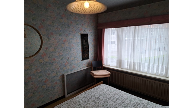 Een ruime woning met tuin en 5 garages in het centrum van Oostmalle - foto 5