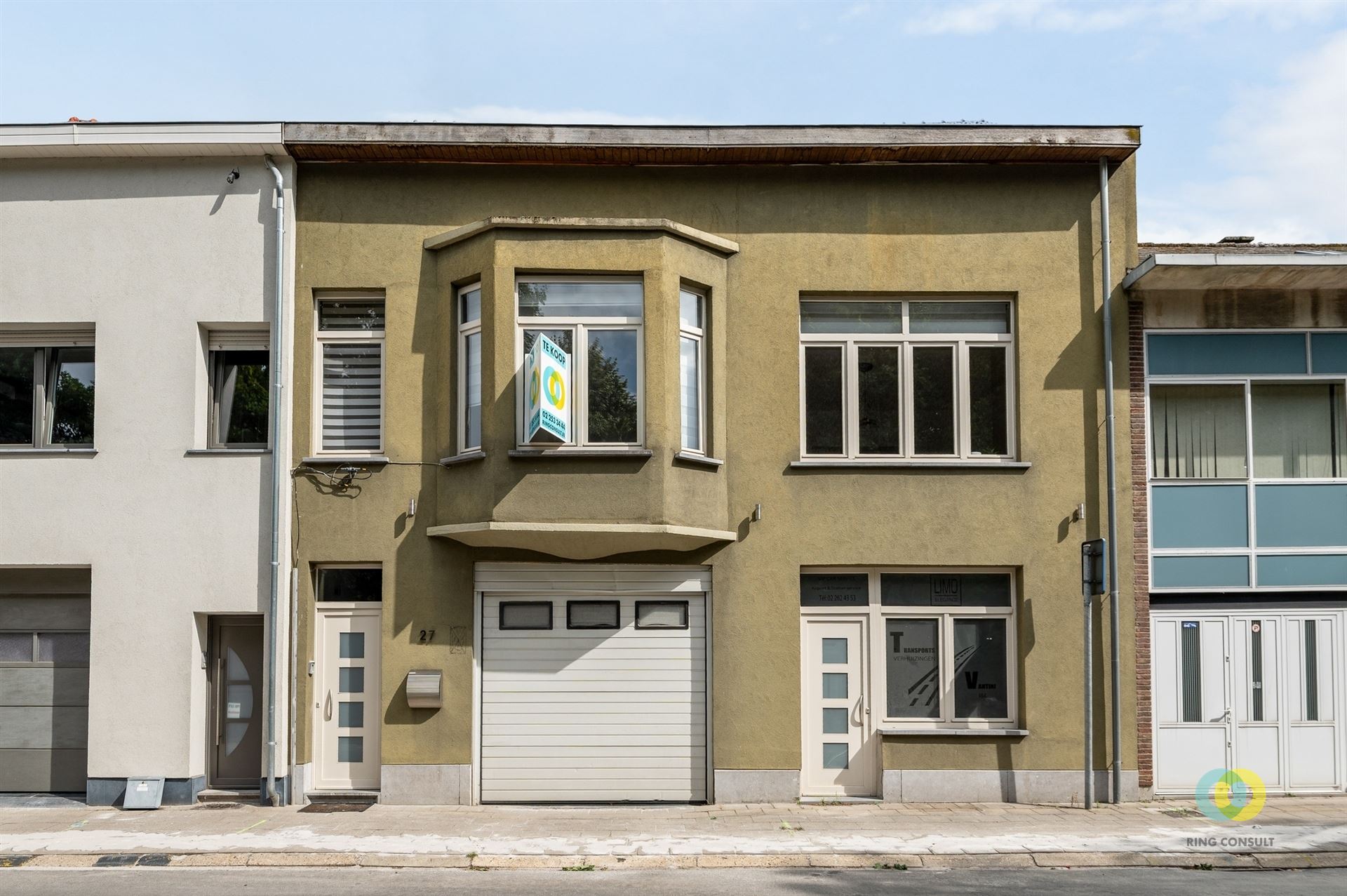 Bedrijfspand met loods, kantoor en appartement - foto 1