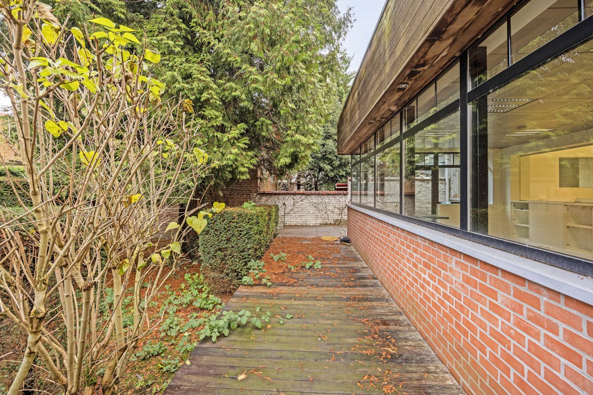 Commerciële ruimte met duplex-appartement te koop in Evere - foto 2