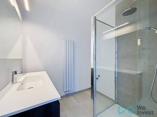 <p>Découvrez ce <strong>magnifique appartement entièrement rénové</strong>, idéalement situé <strong>Heilige Dominicus Saviolaan 12 à Dilbeek</strong>. Grâce à son emplacement central, vous bénéficiez d'une excellente accessibilité et vous vous trouvez à quelques pas des commerces, des écoles, des transports en commun ainsi que de toutes les commodités du quotidien. Les liaisons rapides vers Bruxelles et le Ring font également de ce logement un choix idéal pour les navetteurs.<span></span></p>
<p>Situé au <strong>premier étage</strong>, cet appartement prêt à emménager allie confort moderne et agencement fonctionnel.</p>
<p>Dès l'entrée, vous découvrirez un hall d'entrée avec un <strong>WC séparé</strong>. Celui-ci mène à un agréable séjour lumineux avec une <strong>cuisine ouverte entièrement équipée</strong>. Son espace de vie ouvert offre une belle sensation de volume, tandis que les grandes fenêtres apportent une abondante lumière naturelle.</p>
<p>Attenante au séjour, une <strong>buanderie pratique</strong> offre un espace de rangement supplémentaire ainsi que l'emplacement idéal pour une machine à laver et un sèche-linge.</p>
<p>L'appartement comprend également une <strong>salle de douche moderne</strong> et une chambre confortable, ce qui en fait un logement parfaitement adapté à une personne seule ou à un couple.</p>
<p>Grâce à sa rénovation complète, vous profitez d'un appartement contemporain, économe en énergie et entièrement prêt à emménager.</p>
<p>Vous êtes à la recherche d'un appartement moderne et prêt à vivre au cœur de Dilbeek ? Ce bien mérite assurément votre visite.</p>
<p>📞 <strong>Contactez-nous dès aujourd'hui pour plus d'informations ou pour organiser une visite.</strong></p>
<p>📧 <strong>dilbeek@weinvest.be</strong><br />📱 <strong>0497 248 251</strong></p>