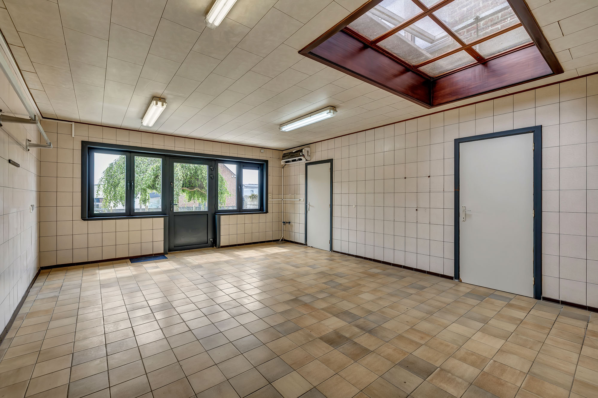 Handelshuis met commercieel gkvls en app met 3 slpks en tuin - foto 5