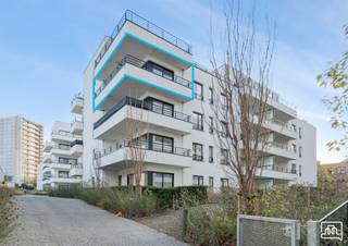 EVERE: Stijlvol en lichtrijk 2-slaapkamer hoekappartement met berging en overdekte staanplaats, gelegen in de onmiddellijke omgeving van NATO...