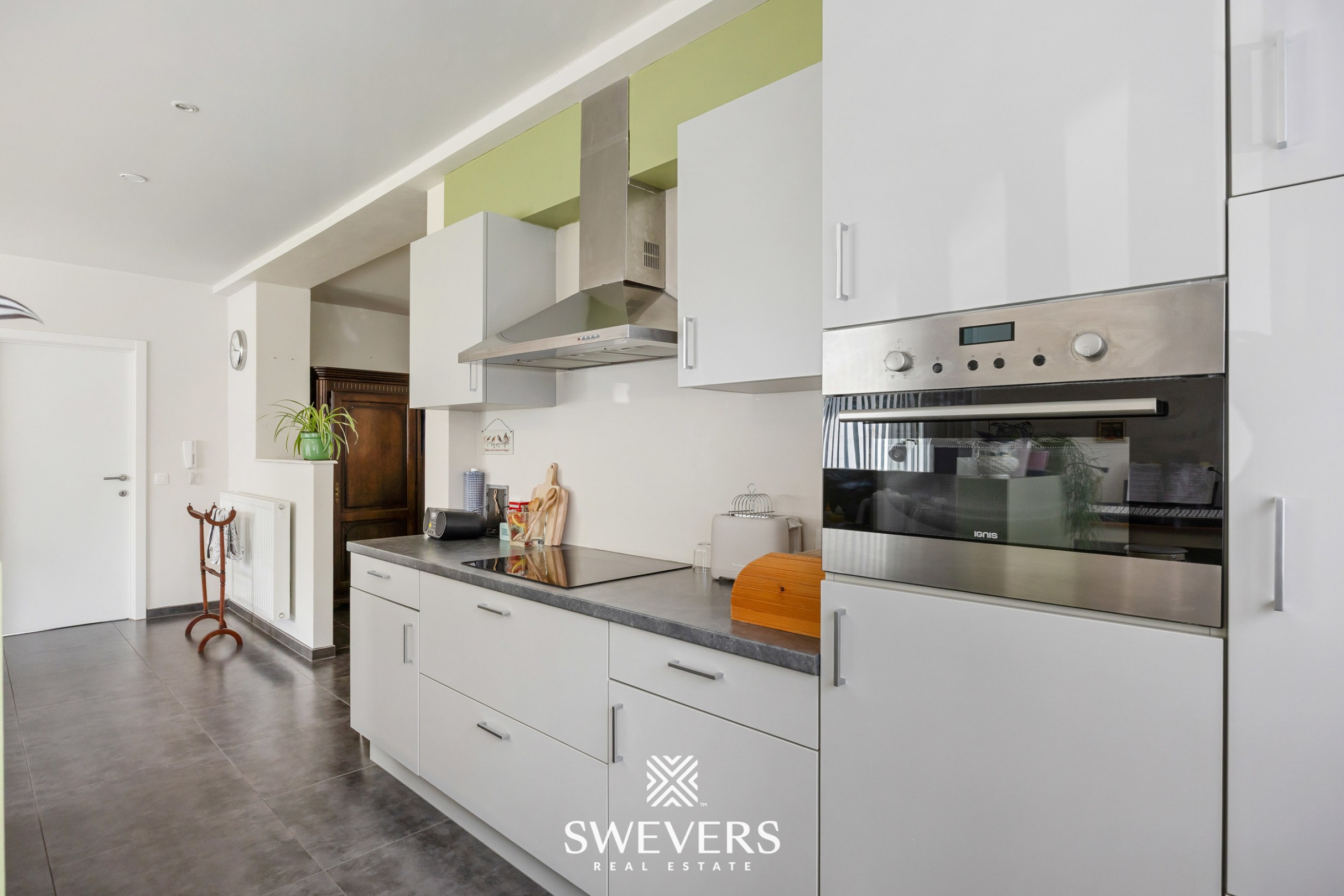Gelijkvloers appartement met twee slaapkamers en bouwgrond te Herk-de-Stad - foto 5