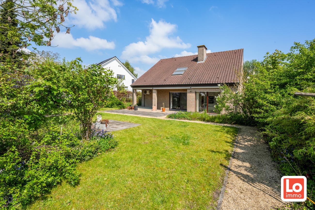 Ruime en degelijke open woning met inpandige garage en gezellige zuidwest georiënteerde tuin op een rustige locatie nabij het centrum van Lochristi! - foto 5