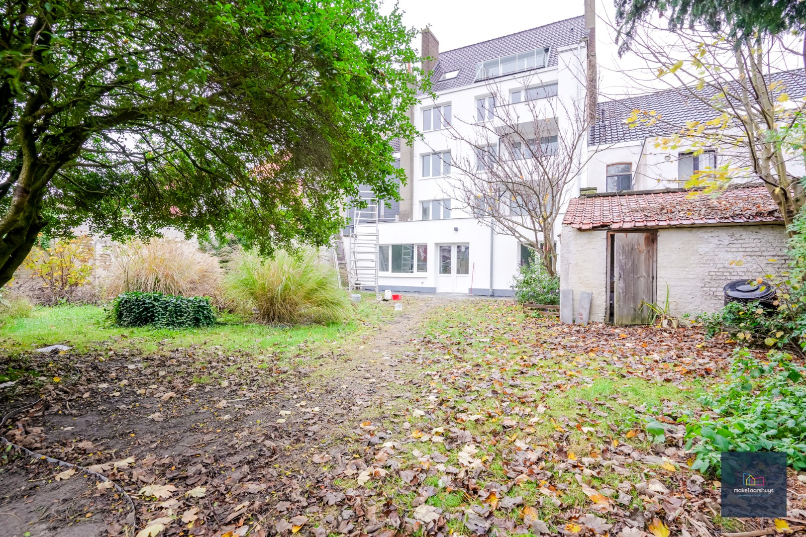 Ruim gelijkvloersappartement met 2 slaapkamers , een zuidgeorienteerde tuin en garage - foto 3
