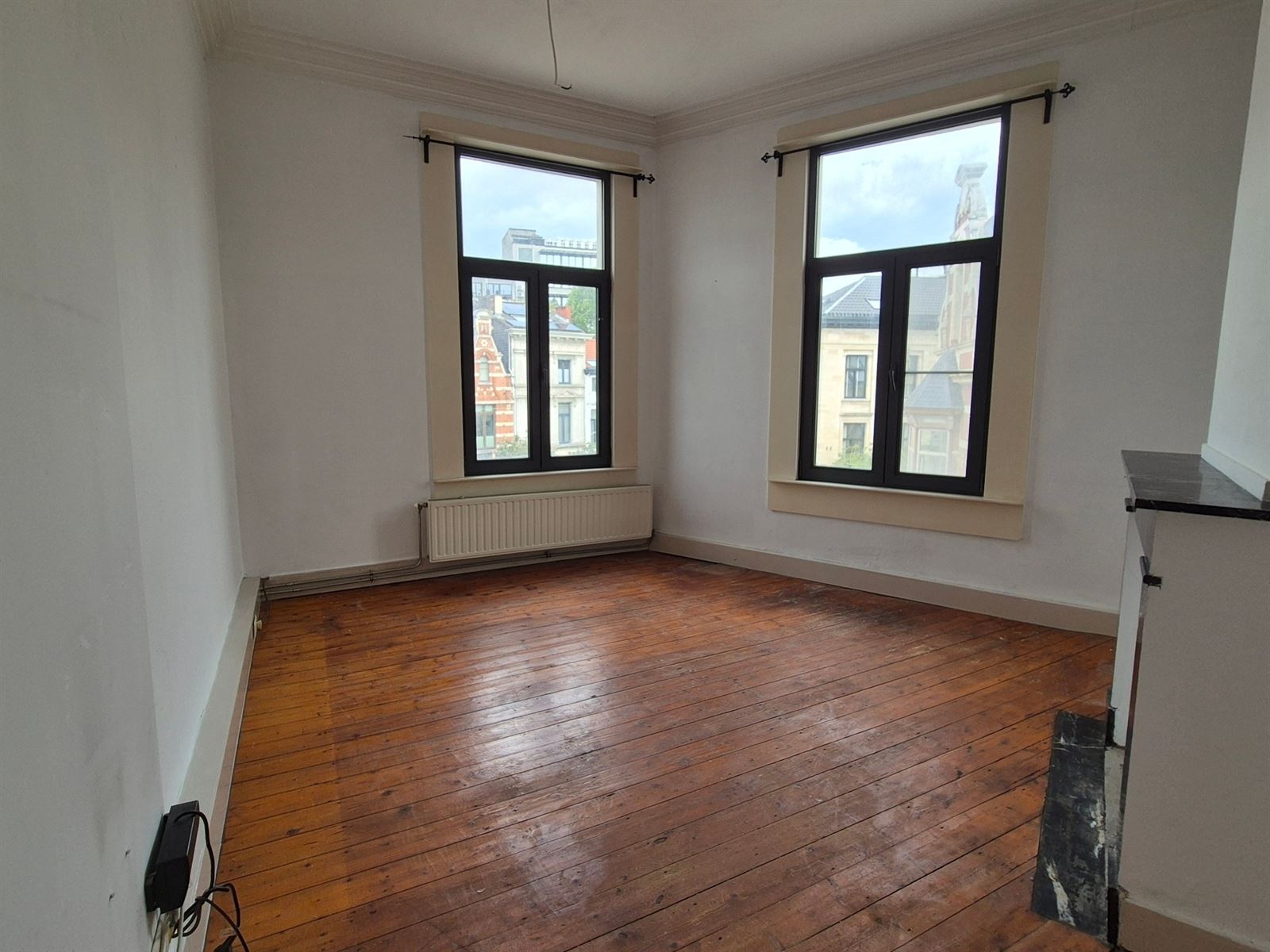 1-slpk Appartement aan de bruisende Dageraadplaats - foto 2