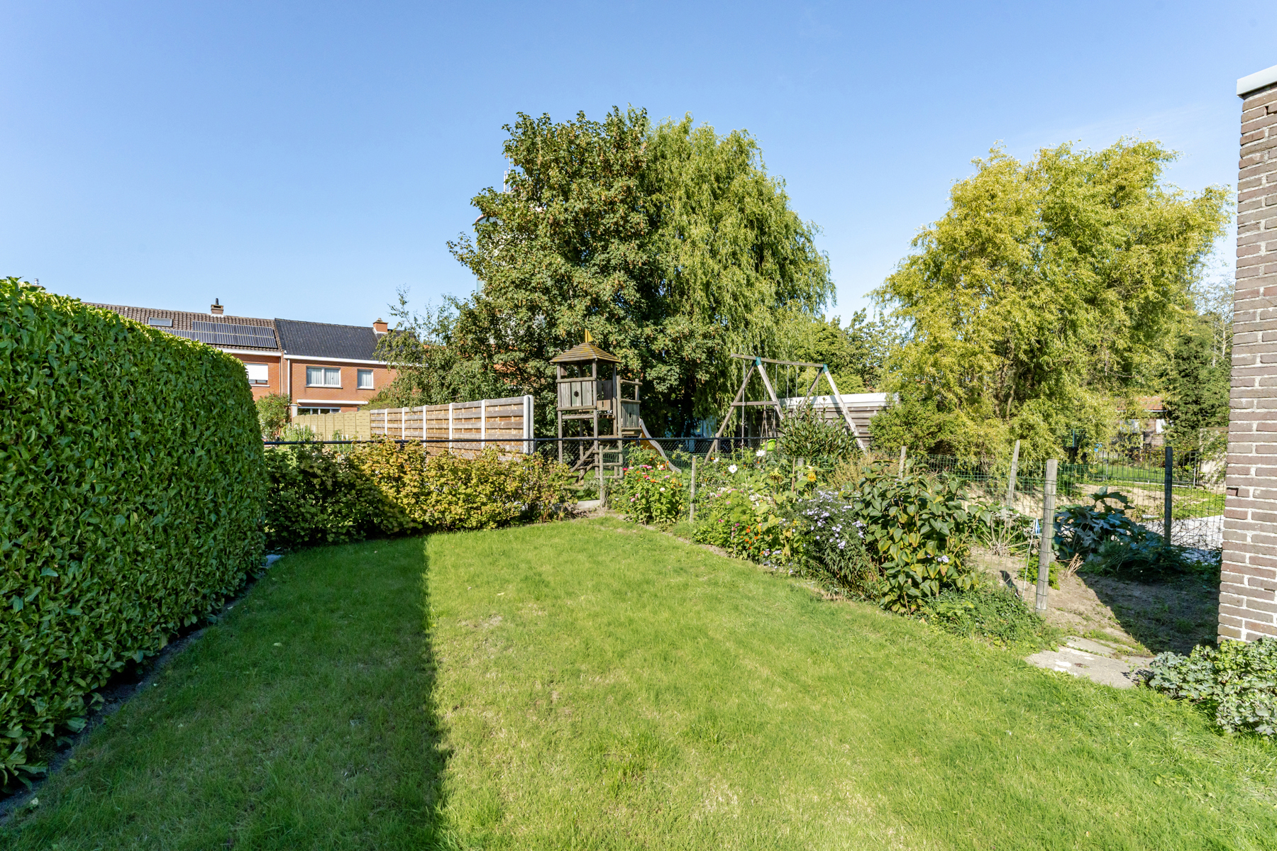 Verzorgde en lichtrijke gezinswoning met tuin en garage - foto 4