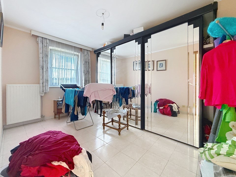 Goed gelegen woning met 3 slaapkamers én achterliggende garage - foto 4