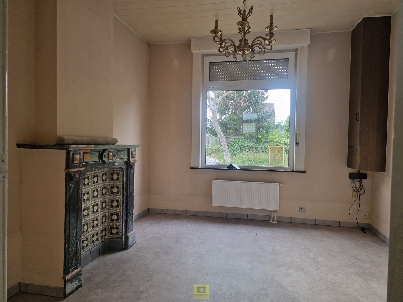 Woning met tuin, garage én bouwgrond voor open bebouwing. - foto 4