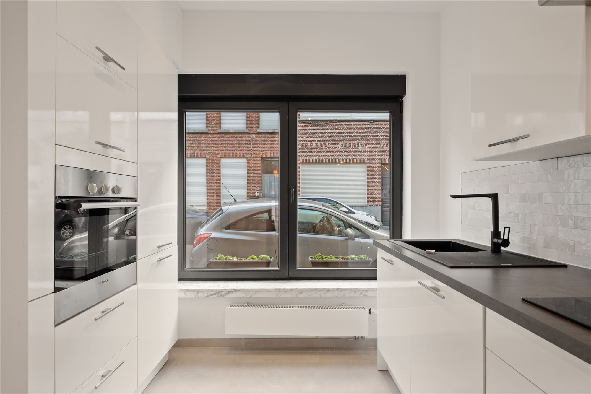 Vernieuwde woning met 3 kamers en tuin in stille straat - foto 5