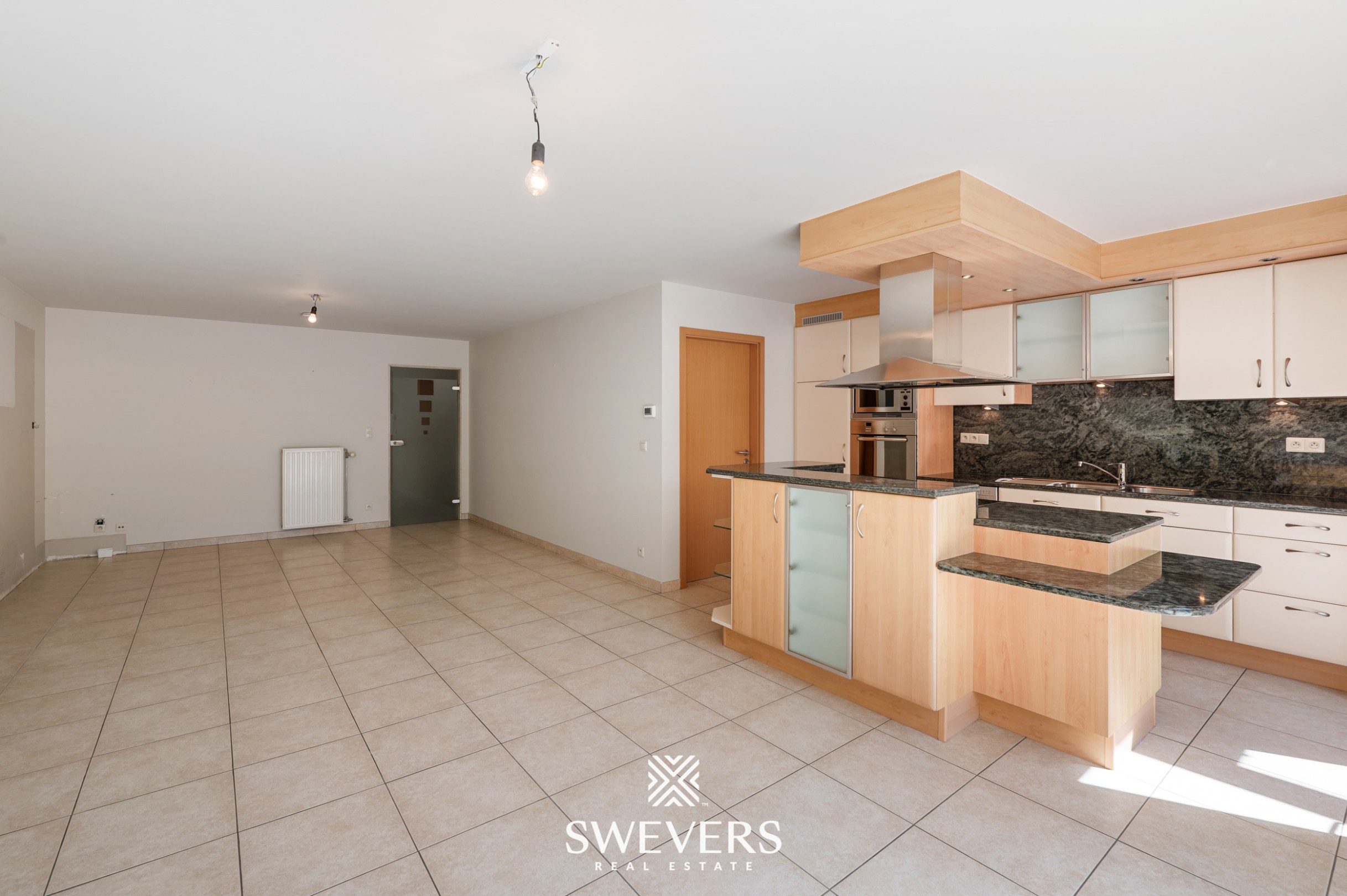 Gelijkvloers appartement met twee slaapkamers, ruime veranda en terras te Bree - foto 5
