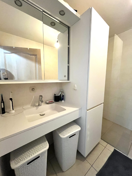 Centraal gelegen appartement met 2 slpks + garage/staanplaats - photo 5