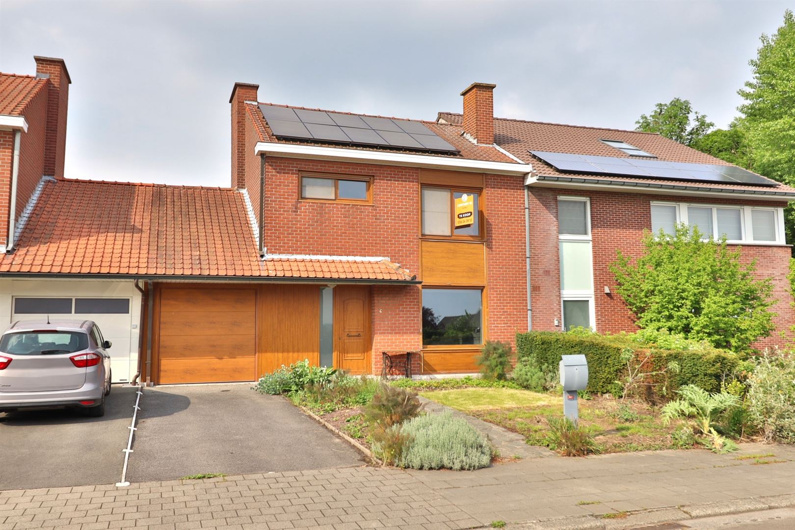 Rustig gelegen woning met garage en tuin - foto 1