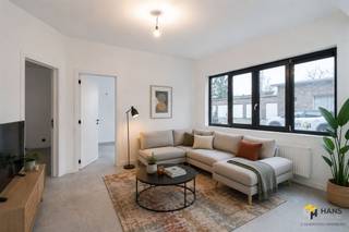 <p><span>On an ideal location in Edegem - quiet yet close to the center - we find this ready-to-use apartment, which is part of a renovated corner building consisting of 6 residential units. The entire property has just been completely renovated and no expense has been spared to finish it to perfection with quality materials. The roof and windows have been renewed and a new condensing boiler has also been installed in each apartment. Furthermore, the electricity is compliant and the facade has been completely renovated. In short: a hassle-free purchase in which you can move in immediately!</span></p><p><span> </span></p><p><span>The apartment has a total area of about 60 m² and has 2 full-size bedrooms. The open kitchen is fully equipped with Siemens appliances and features a composite worktop. The compact bathroom has a shower, sink unit, toilet and towel dryer.</span></p><p><span> </span></p><p><span>Finally, the property has a private basement storage room and bike storage. The meters for water, gas and electricity are separate. Living area 60 m² ref: gross floor area. EPC certificate. For more info or a free estimate visit www.hansimmo.be</span></p><p><span> </span></p>