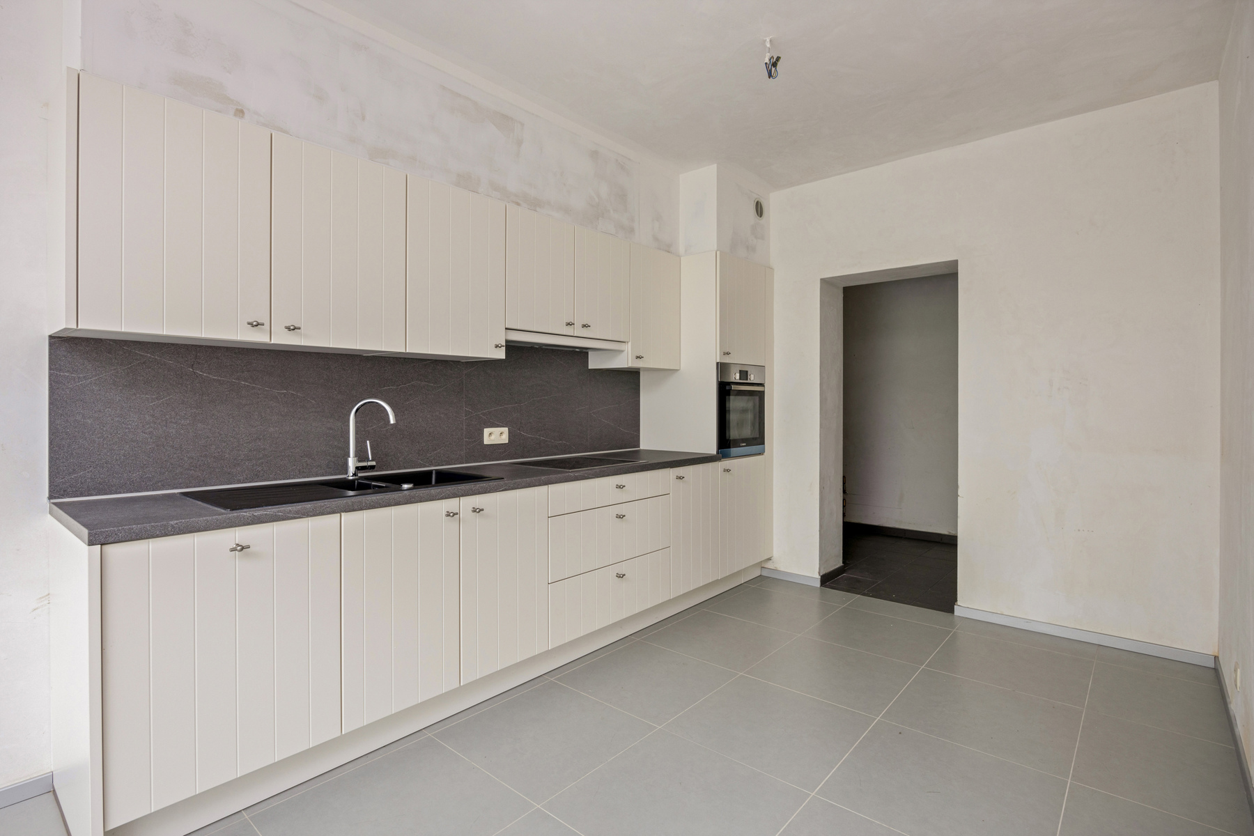 Ruim gelijkvloers appartement met 1 slaapkamer - foto 5