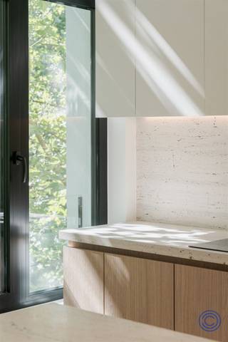 <p><span>Apartment Information</span></p><p><span>Located on a quiet, tree-lined one-way street, within walking distance of Marnixplaats, the KMSKA, restaurants, and coffee shops, is this luxuriously renovated apartment. The combination of a prime location, high-quality finishes, and the comfort of a new-construction home makes this an exceptional living opportunity in Antwerp South. </span></p><p><span> </span></p><p><span>The apartment was finished with an eye for detail using timeless materials such as travertine, light oak, herringbone parquet, and custom-made elements. The elegant entry hall with built-in closets leads to a light-filled living space with high ceilings, a spacious seating area, a full-sized dining area, and elegant wall cabinets. The open kitchen flows seamlessly into this space and features travertine finishes, high-end appliances, and a luxurious, natural aesthetic.</span></p><p><span> </span></p><p><span>From the living area, you have access to a pleasant outdoor space of approximately 19 m²: a rare asset in this location. </span></p><p><span> </span></p><p><span>The night hall leads to two spacious bedrooms, both with an en-suite bathroom featuring a walk-in shower and a designer vanity unit. The top floor offers a versatile attic room with air conditioning. </span></p><p><span> </span></p><p><span>This small-scale building, with only three apartments, has been completely renovated and will be completed in 2026 in compliance with EPB standards. EPC rating A, electricity system compliant at closing, individual meters, and low monthly costs.</span></p><p><span> </span></p><p><span> Live in a home with the look and performance of a new build, VAT-exempt, in one of Antwerp’s most sought-after locations.<br /><br /></span></p><p><span>Layout</span></p><p><span>Second floor</span></p><p><span>Upon entering the apartment, you step into an elegant entry hall with built-in custom cabinets, which immediately sets the tone for the rest of the home. There is a separate guest restroom with a hand sink.</span></p><p><span> </span></p><p><span>The living area forms the heart of the apartment: a particularly pleasant and light-filled living room with high ceilings, herringbone parquet flooring, and stylish custom finishes. The space easily accommodates a comfortable seating area with a spacious sofa, a full-sized dining area for a large table, and additional storage space thanks to the built-in closets and a sophisticated wall cabinet. The living area opens onto the outdoor space, consisting of a 10m² terrace and a 9m² green roof. This outdoor space serves as a rare and exceptionally pleasant extension of the living area: ideal for an aperitif, a quiet morning coffee, or an intimate al fresco dinner.</span></p><p><span> </span></p><p><span>The open kitchen flows seamlessly into the living area and is finished with luxurious travertine. It is fully equipped with high-quality appliances, including an induction cooktop, range hood, dishwasher, convection oven, microwave, refrigerator, and freezer. The combination of natural materials and modern functionality creates a timeless, elegant look.</span></p><p><span> </span></p><p><span>Third Floor</span></p><p><span>The night hall provides access to two spacious bedrooms, each equipped with built-in closets and its own en suite bathroom. Both bathrooms feature a walk-in shower and a travertine sink, ensuring a particularly high-quality and uniform finish.</span></p><p><span> </span></p><p><span>This floor also features a separate toilet. Under the stairs leading to the attic, there is a practical connection for a washing machine and/or dryer, subtly integrated without compromising aesthetics.</span></p><p><span> </span></p><p><span>Fourth Floor</span></p><p><span>The top floor houses a spacious, air-conditioned attic room. This versatile space is perfect as a master suite, home office, guest room, or hobby room. Thanks to its separate location, this floor offers an extra sense of privacy and comfort.</span></p><p><span> </span></p><p><span>Highlights</span></p><p><span>This apartment stands out for its high-quality finishes and exceptional renovation standards. The combination of travertine, light oak, herringbone parquet, custom-made features, and high ceilings creates a timeless, luxurious ambiance.</span></p><p><span> </span></p><p><span>Additional perks include built-in closets, a spacious terrace, the option to purchase an additional storage unit, and low monthly expenses, estimated at approximately 25 euros per month.</span></p><p><span> </span></p><p><span>General Information</span></p><p><span>The apartment has individual meters for gas, water, and electricity. Thanks to the thorough renovation, it has an EPC rating of A. The electrical inspection report will be provided with the deed. The asbestos certificate is currently pending.</span></p><p><span> </span></p><p><span>The buyer’s share of the cost for drafting the basic deed is 1,000 euros, including VAT.</span></p><p><span> </span></p><p><span>The Building</span></p><p><span>This small-scale building consists of a basement and only three apartments. It has been completely renovated and will be delivered in 2026 in compliance with EPB standards. Among other things, the ventilation system was replaced, the roof structure was renovated and insulated, a green roof was installed, the front and rear facades were insulated, and new exterior window and door frames were installed.</span></p><p><span> </span></p><p><span>So, you are essentially purchasing an apartment with the comfort and technical performance of a new construction, without having to pay VAT.</span></p><p><span> </span></p><p><span>The building also features a central smoke detection system and a videophone. There is no elevator.</span></p><p><span> </span></p><p><span>Location</span></p><p><span>The location is undoubtedly one of its greatest assets. The apartment is situated on a quiet, tree-lined one-way street, in a prime location in Antwerp, close to Marnixplaats in the Zuid district.</span></p><p><span> </span></p><p><span>Restaurants, coffee bars, cozy cafés, boutiques, concept stores, and the renovated KMSKA are all within walking distance. At the same time, you’ll enjoy easy access to the Antwerp ring road.</span></p><p><span> </span></p><p><span>With a Mobiscore of 9.6/10, this is the ideal place for anyone who wants to live comfortably, stylishly, and in an urban setting in one of Antwerp’s most sought-after locations.</span></p><p><span> </span></p><p><span>Viewing Day: July 11</span></p><p><span>Interested candidates may submit an offer, after which the seller will thoroughly and carefully review each offer.</span></p><p><span>The real estate agency will notify candidates of the decision or next steps no later than 3 days after the open house.</span></p><p><span> </span></p><p><span> *The information in this brochure is provided for informational purposes only: prospective buyers are responsible for obtaining, verifying, and interpreting this information on their own.</span></p>