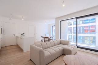 Discover this bright new-build apartment for sale, ideally located near the sea along the Hofstraat in Ostend. The apartment is part of the Zephyr Residence and is located on the 2nd floor. Here you live within walking distance of the beach, the sea, the bustling city center and all necessary amenities.<br /><br />Layout:<br />- entrance hall<br />- bright living space<br />- open kitchen equipped with an induction stove, double sink, dishwasher, fridge with freezer and oven<br />- terrace (5m²)<br />- bedroom (11m²)<br />- bathroom equipped with a bathroom cabinet and rain shower<br />- large storage room with a practical connection for the washing machine<br />- separate toilet with hand wash basin<br />- private basement storage in the building<br /><br />In addition, the building has a communal bicycle shed.<br /><br />Pros:<br />- excellent location near the sea and the center of Ostend<br />- new construction with a high-quality finish<br />- bright<br />- energy efficient<br />- covered terrace<br /><br />Sales under the 21% VAT scheme.<br /><br />Are you looking for a new-build 1-bedroom apartment by the sea for sale in Ostend? Contact us quickly for an on-site visit!<br /><br />Register of measures: no