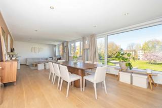 <p>Located in Rhode-Saint-Genèse, in a quiet, leafy setting, this beautiful flat boasts pleasant, unobstructed views of the park. With a floor area of ±100 m², it was fully renovated in 2023 and gets plenty of natural light thanks to its prime location.</p>
<p>The living area comprises a cosy living room with a fully built-in open-plan kitchen, ideal for entertaining. The flat currently has two lovely bedrooms of ±12 m² and ±14 m² each, with the potential to create a third bedroom, as well as a modern shower room.</p>
<p>The property has a private garage (+ 35.000 € MANDATORY), and benefits from easy parking within the estate.</p>
<p>The property is set to gain a new terrace, with work scheduled to be finalized in June 2026.</p>
<p>A high-quality property combining comfort, functionality and a privileged living environment, perfect for those who love peace and nature.</p>
<p>Electrical installation compliant.</p>
<p>Energy Performance Certificate: B</p>
<p>Service charges (shared areas, insurance, management fees, maintenance, etc.): ± €200 per month</p>
<p>A home ready to welcome its new occupants – you’re sure to fall in love with it!<br /><br /></p>
<p><u>Flat No. 5 on the 2nd floor</u></p>
<ul>
<li>Entrance hall</li>
<li>Spacious and bright living room of approx. 57m² with wooden flooring, opening onto a west-facing terrace of approx. 13m²</li>
<li>Fully fitted open-plan kitchen</li>
<li>Two lovely bedrooms of approx. 12m² and approx. 14m² – potential to create a third bedroom</li>
<li>Shower room with laundry facilities</li>
<li>Garage space No. 5 (+ 35,000 € MANDATORY)</li>
</ul>
<p></p>