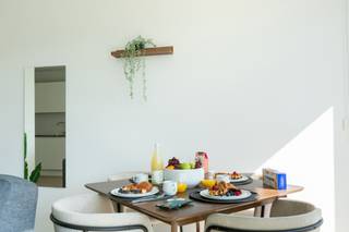 Located in the heart of Brussels, in the lively De Brouckère district and close to all amenities (transport, shops, restaurants, etc.), this beautiful furnished apartment of approximately 58 m² is on the 3d floor of a recently renovated building. It comprises a bright living room, a fully equipped open-plan kitchen, a comfortable bedroom, a modern shower room, a laundry room, a separate toilet and a pleasant balcony. The property is in excellent condition and offers all the necessary amenities: lift, double glazing, individual gas heating, water softener. Charges: Fixed fee of 195€ (communal, heating, hot water, WiFi and waiver of recourse insurance ). EPC: C+. Available on 01/11/2026. Measurements provided for information purposes only.