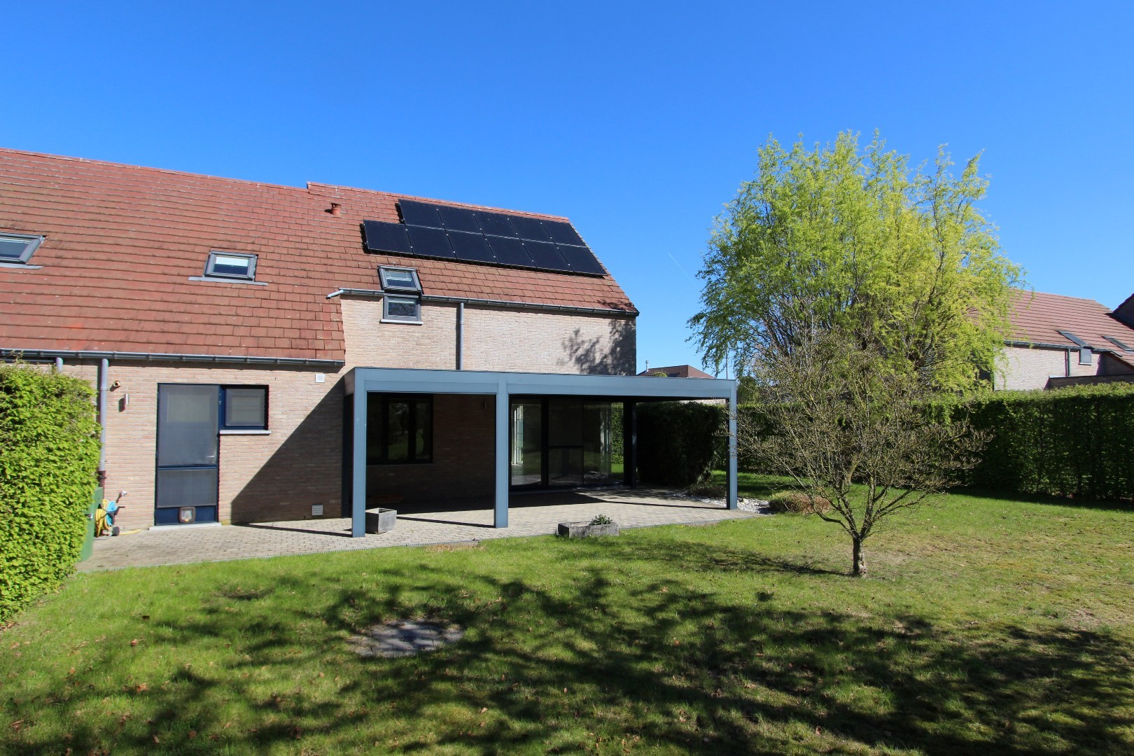 Ruime woning met groot zuidgericht terras en aangename tuin - EPC label B! - foto 3