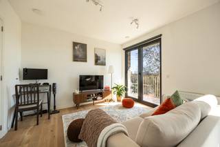 Modern 1-slaapkamerappartement met terrasGelegen op een toplocatie nabij winkels en voorzieningen aan de Plantin en Moretuslei, met vlotte...