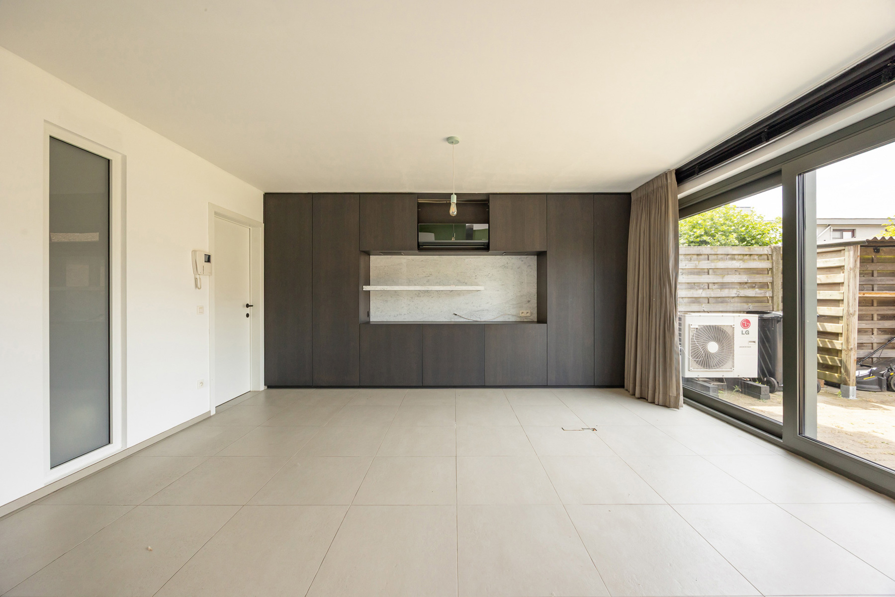 Gelijkvloers appartement met tuin en parkeerplaats - foto 5