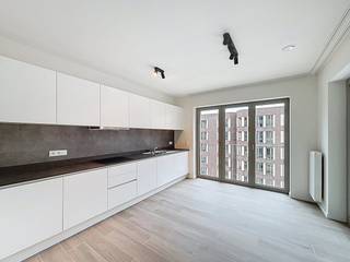 Te huur: appartement in gebouw Metropolitan (Parkdreef), gelegen aan Tour & Taxis.Het appartement heeft een totale oppervlakte van 94.6 m² en...