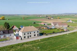 <p><span>VELAINES - Are you looking for a rural property to renovate?</span></p><p><span>Then this property may be for you!</span></p><p><span> </span></p><p><span>The main features in a nutshell:</span></p><ul><li><span>Convenient and quiet location just outside the center of Frasnes-lez-Anvaing.</span></li><li><span>View of the hills of the Pays des Collines</span></li><li><span>Centrally located between Ronse and Leuze</span></li><li><span>Easy access to N60 and E429 (Brussels-Lille)</span></li><li><span>Very large attic with huge potential </span></li><li><span>Garage</span></li><li><span>Nice garden facing South-West</span></li><li><span>Cellar available</span></li><li><span>Guide price €138,000 </span></li></ul><p><span> </span></p><p><span>This is what the house looks like: </span></p><p><span>On the ground floor we find the spacious and bright living room with wood burning fireplace and recent pellet stove. The dining room with adjoining kitchen from where access to the attic and the cellar. The bedroom and the bathroom with sink, shower and toilet.</span></p><p><span>The attic offers huge potential for creating additional rooms with bathroom/hobby room/studio. </span></p><p><span>The South-West facing garden with beautiful views of the hills of the Pays des Collines. Furthermore a garage and a garden house.</span></p><p><span> </span></p><p><span>Important: Some visualizations are purely indicative and serve for inspiration only. The image does not take into account urban planning regulations, building permits or legal restrictions.</span></p><p><span> </span></p><p><span> </span></p><p><span> </span></p><p><span> </span></p><p><span> </span></p>