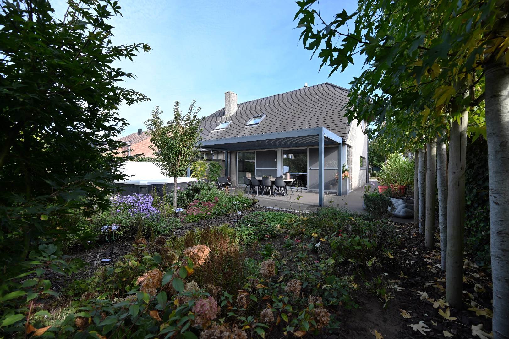 Instapklare woning met 3 slpks, garage, tuin én zonneterras te Kluizen - foto 2
