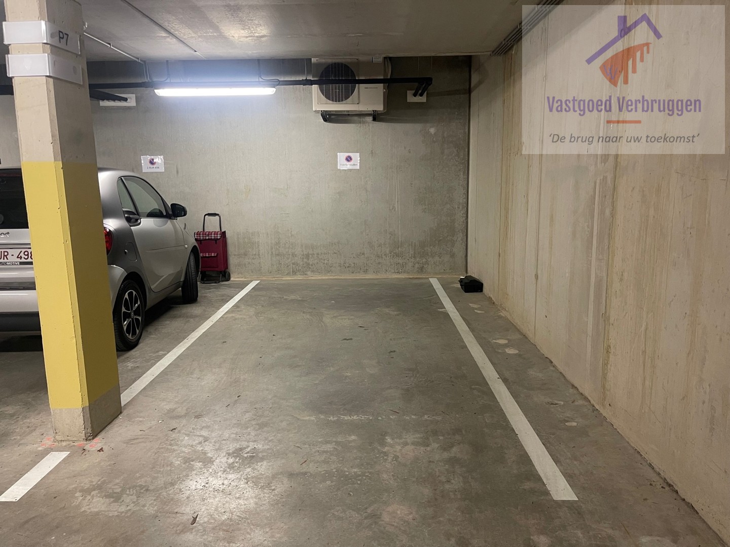 Aoverdekte autostaanplaats in centrum Aalst - foto 1