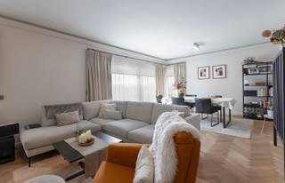 On the third floor of a well-maintained building, this beautifully renovated 3-bedroom apartment is quietly located near major road connections in...