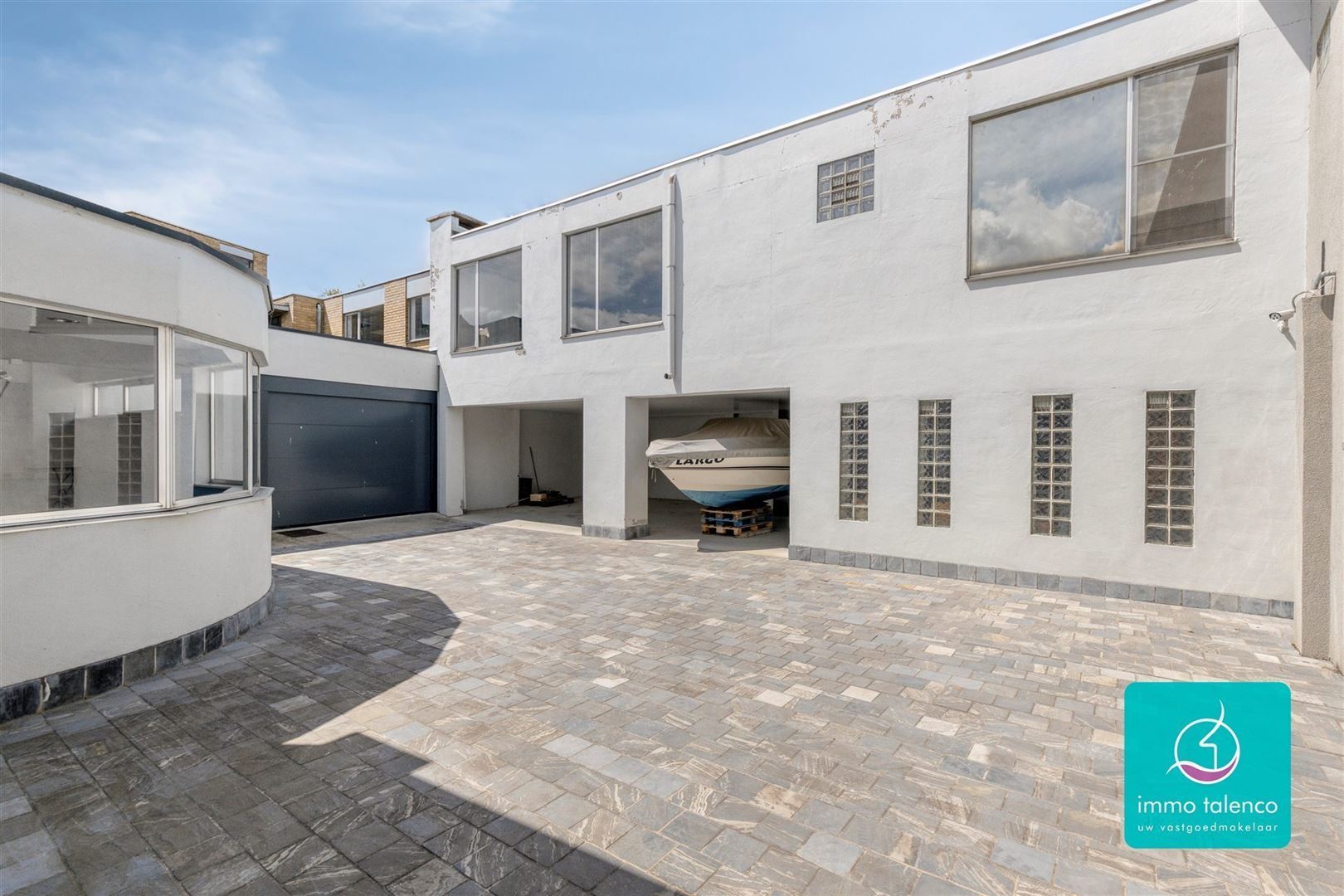 Showroom / loods / kantoorruimte / winkel op 6 a 15 ca - 565 m² - foto 1