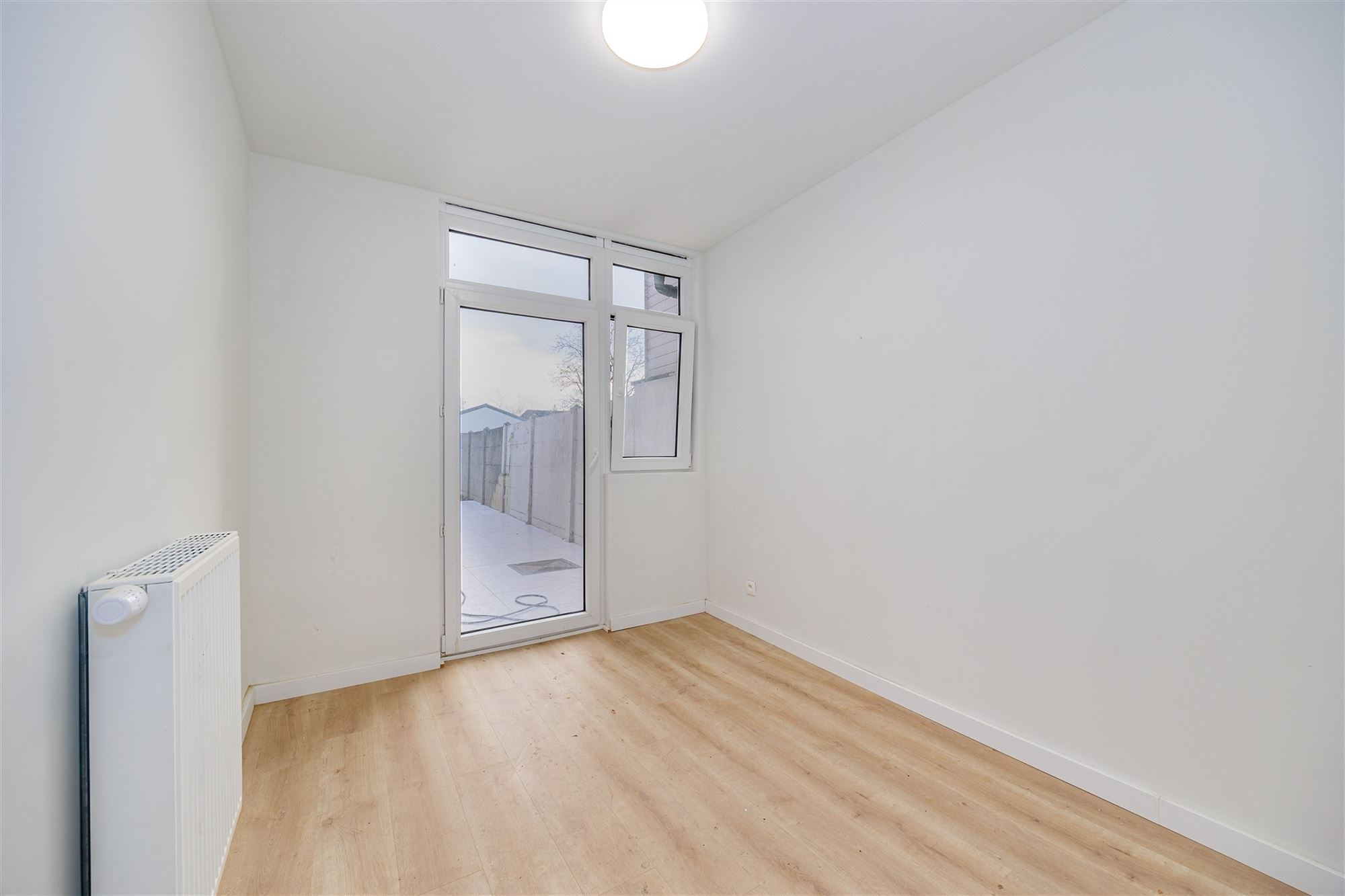 Gelijkvloers instapklaar appartement met tuin - foto 4