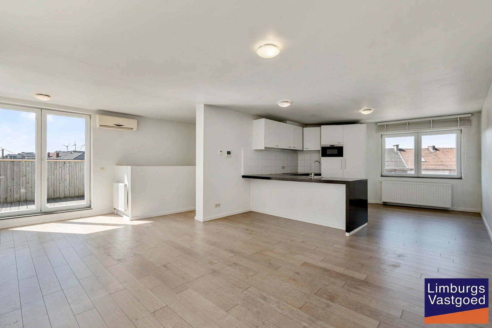 Ruim appartement (125m²) met 2 slpk en terras aan de kleine ring - foto 4