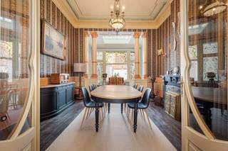 This authentic mansion from the early 20th century (1907) is located in the belle-époque district of Blankenberge, just 150 meters from the promenade, sea, and beach. You live here in a quiet part of the city, with shops, restaurants, and public transport nearby, and with the nature of dunes and polders within walking distance.<br /><br />The property in art nouveau style exudes character and elegance thanks to its stately façade, high ceilings, and spacious layout. The authenticity has been carefully preserved. The ground floor includes a spacious entrance hall, multiple living spaces (living room, dining room, family room), and a kitchen with access to a cozy patio terrace.<br /><br />On the upper floors, there are 7 bedrooms and various living spaces: three bedrooms and two bathrooms on the first floor, two bedrooms and an additional living space on the second, and two more bedrooms with a bathroom on the third floor. Above that is a spacious attic storage. A basement with plenty of storage completes the property.<br /><br />This unique mansion is ideal for those seeking space, authenticity, and a prime location on the Belgian coast, perfect as a family home, second residence, or B&amp;B.<br /><br />Advantages:<br />- authentic mansion (1907)<br />- art nouveau style<br />- 7 bedrooms<br />- patio terrace<br />- spacious basement<br />- belle-époque district<br />- only 150 m from the sea and promenade.<br /><br />3D tour at www.hillewaere-vastgoed.be